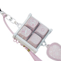 Bloom Celadon keycap keychain and vase charm laid flat