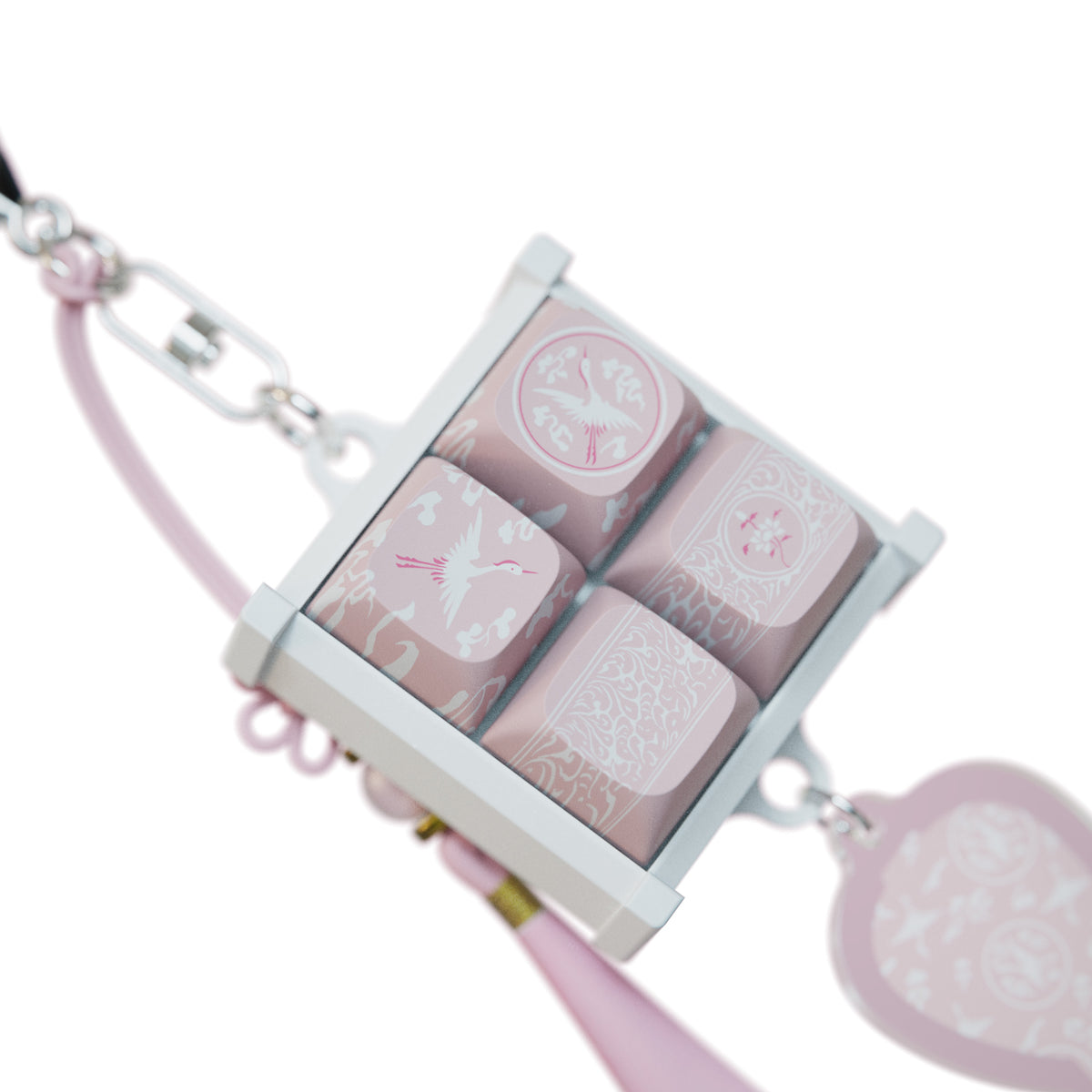 Bloom Celadon keycap keychain and vase charm laid flat