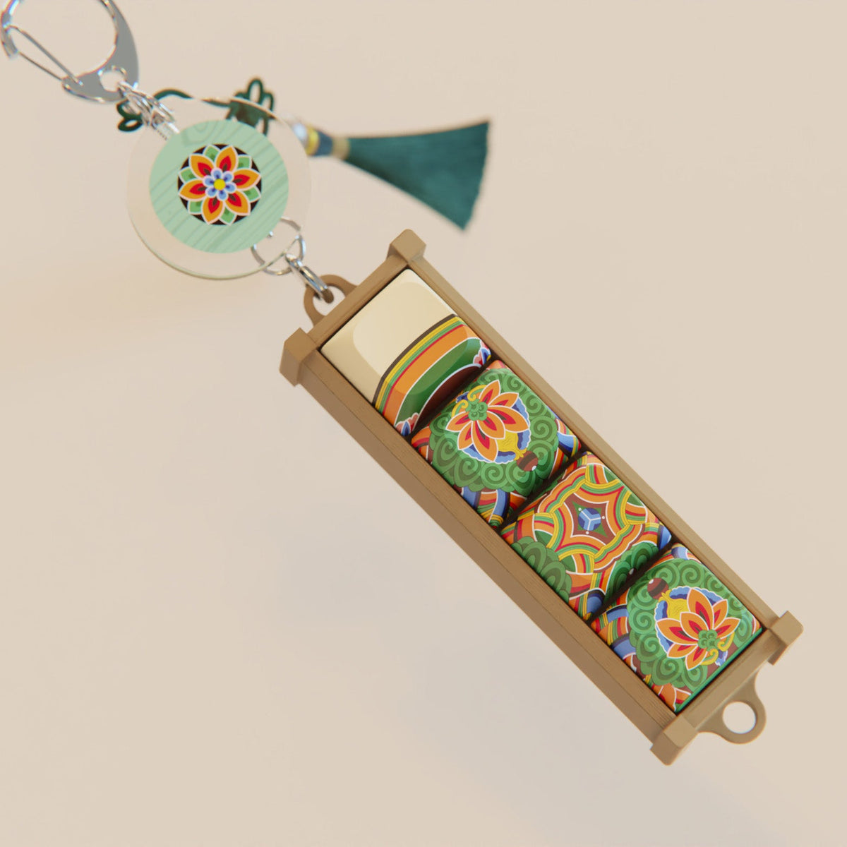 White dancheong keycap keychain with a green tassel